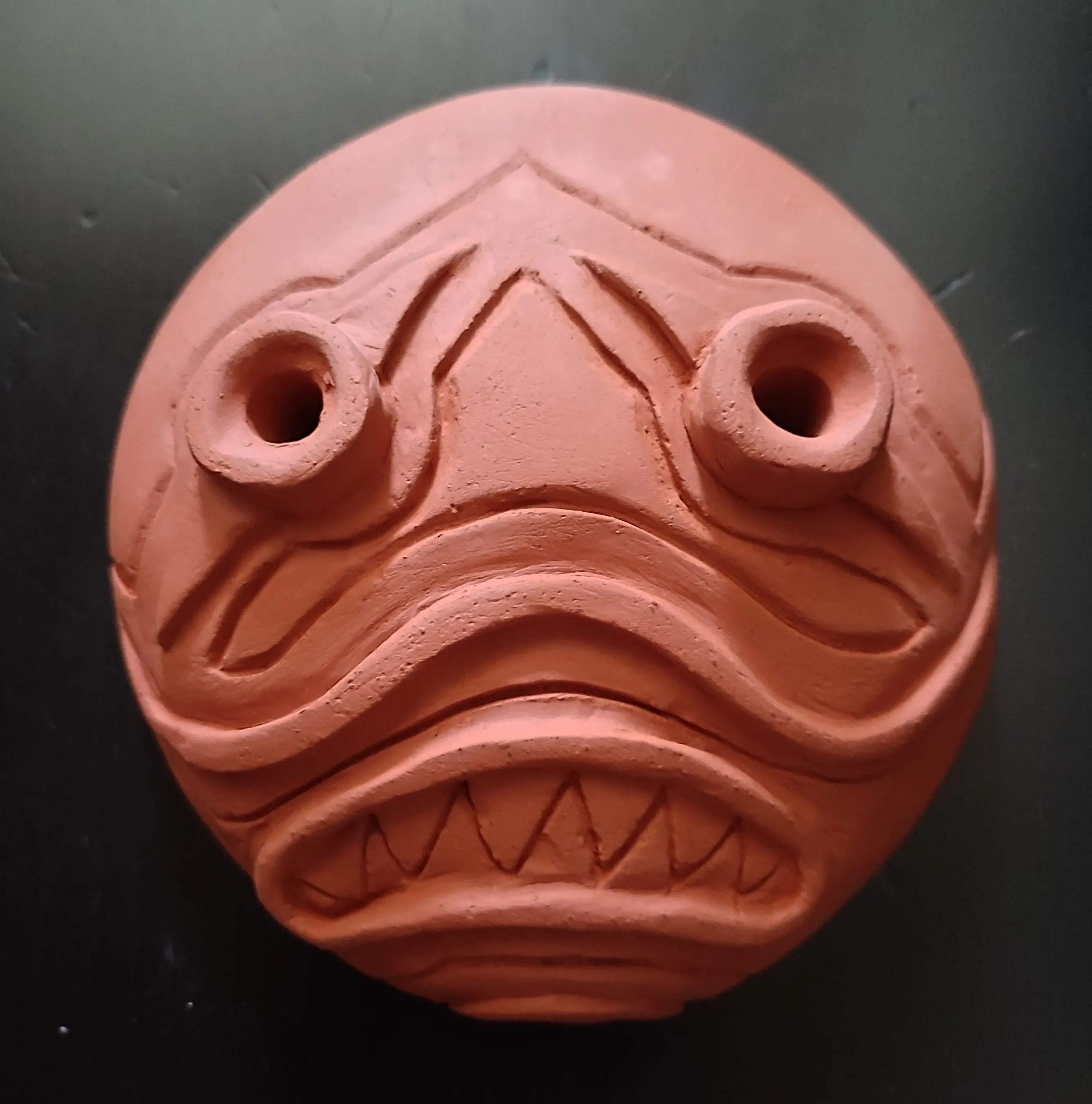 une zolie sculpture « Masque de l'Impatience » que j'ai biloutée en 2021